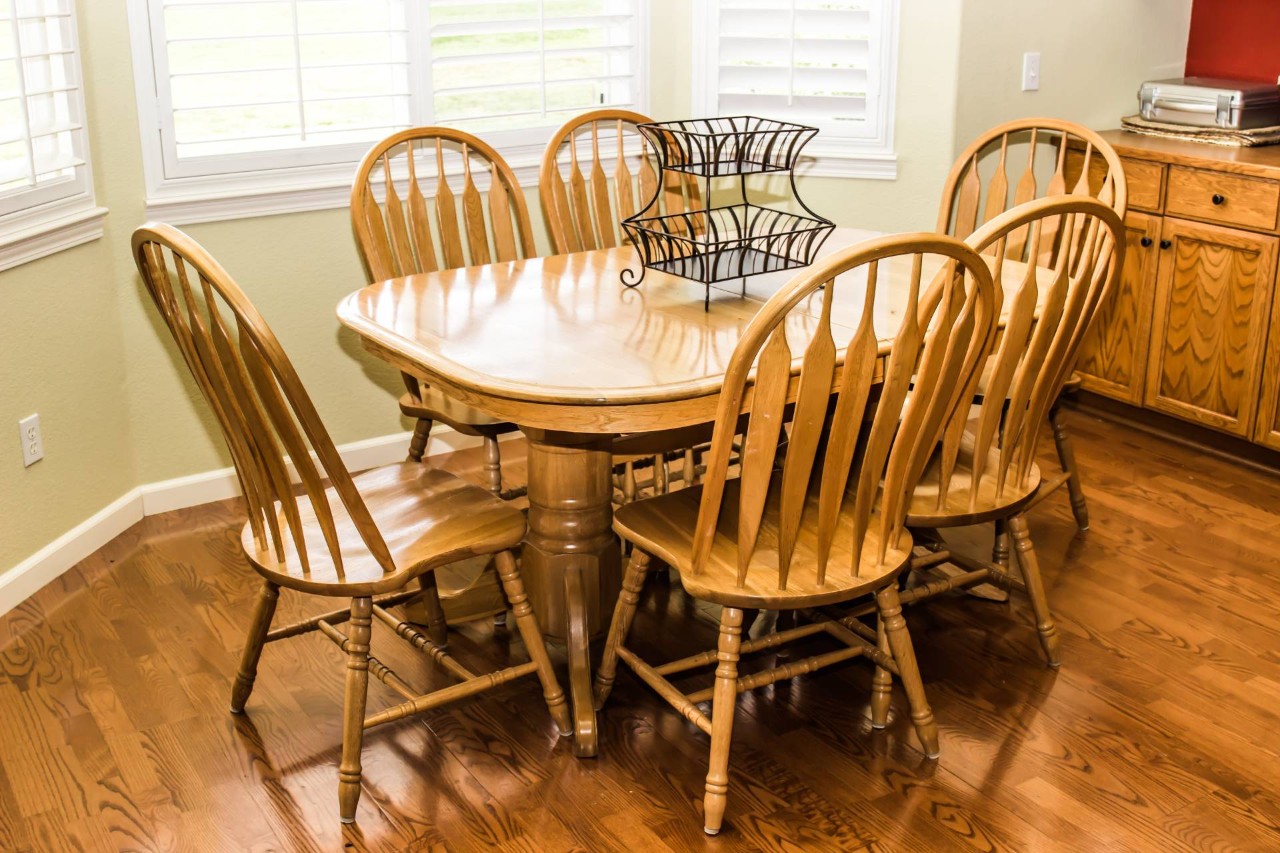 Modern window treatments in a dining room bay window near Tulsa, Oklahoma (OK)