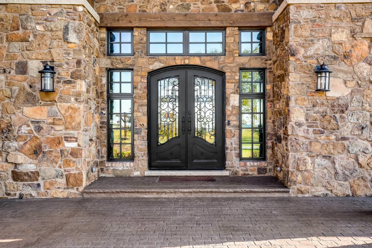 A main doorway for a home with French doors at Blind Ambitions near Tulsa, OK