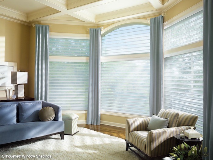 A living room with arched windows.